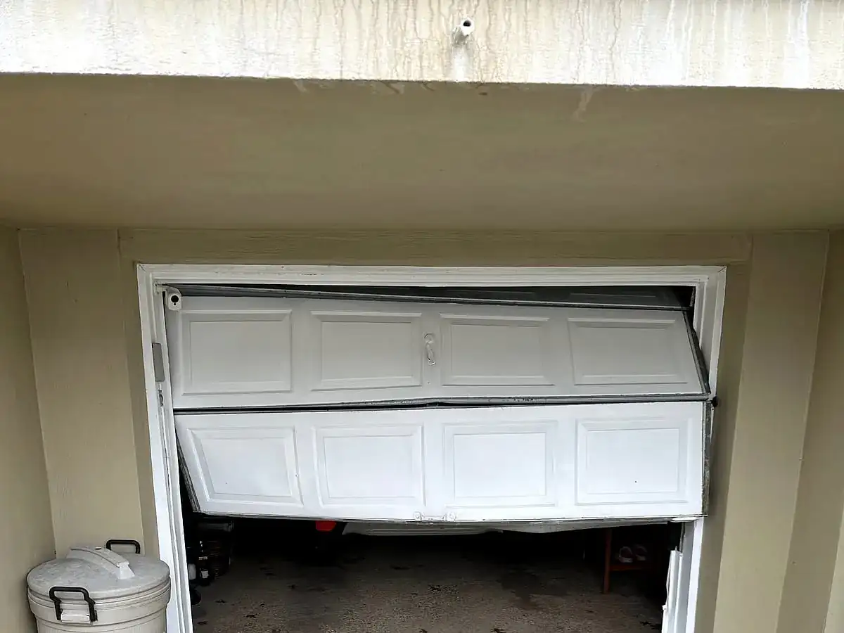 Sagging door, broken spring
