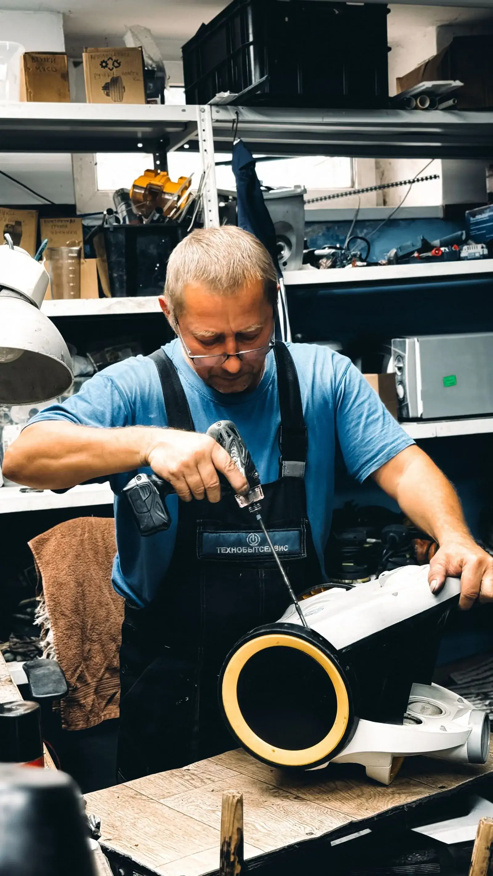 Technician installing a garage door opener